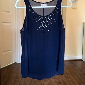 Navy sleeveless top with metal embellishments